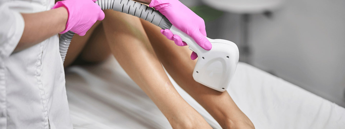 women's legs being lasered for hair removal